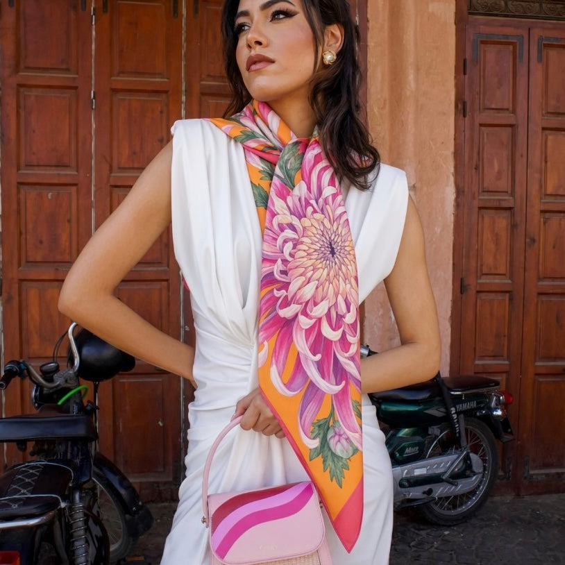 floral scarf draped around nec